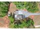 Aerial view of the house highlighting the location, driveway, and landscaping at 720 Cricket Ln, Mt Ulla, NC 28125
