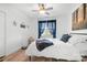 Cozy bedroom with a large window, stylish decor, and comfortable bedding at 720 Cricket Ln, Mt Ulla, NC 28125