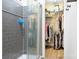 Walk-in closet with shelving, rods and ample storage space at 720 Cricket Ln, Mt Ulla, NC 28125