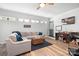 Inviting living room with natural light, comfortable sectional, and stylish decor elements at 720 Cricket Ln, Mt Ulla, NC 28125