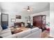 Spacious living room featuring modern exercise equipment and cozy seating arrangements at 720 Cricket Ln, Mt Ulla, NC 28125
