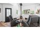 Inviting living room with a cozy fireplace, vaulted ceilings, and modern furnishings at 720 Cricket Ln, Mt Ulla, NC 28125