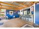 Cozy outdoor bar area with modern seating, fun decor, and ample space for entertaining at 720 Cricket Ln, Mt Ulla, NC 28125