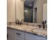 Modern bathroom with double vanity, granite countertops, and a glass-enclosed shower with gray tile at 835 A Wynnshire Dr # 53, Hickory, NC 28601
