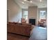 Spacious living room boasting a fireplace, hardwood flooring, and a neutral color scheme perfect for relaxation at 835 A Wynnshire Dr # 53, Hickory, NC 28601