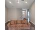 Inviting living room with hardwood floors, neutral paint, and an open view to the front door at 835 A Wynnshire Dr # 53, Hickory, NC 28601