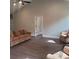 Open living room with vaulted ceiling, hardwood floors, neutral paint, and ample natural light streaming through the windows at 835 A Wynnshire Dr # 53, Hickory, NC 28601