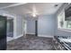 Bright eat-in kitchen with tiled floors, stainless appliances, and light blue walls at 917 Laye St, Belmont, NC 28012