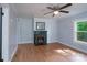 Inviting living room with hardwood floors, a decorative fireplace, and neutral walls at 917 Laye St, Belmont, NC 28012