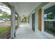 Inviting screened-in porch with white floors and plenty of natural light at 917 Laye St, Belmont, NC 28012