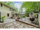 Scenic backyard with a patio, deck, and elegant landscaping, perfect for outdoor entertaining at 920 Habersham Dr, Charlotte, NC 28209