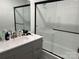 Bathroom featuring glass enclosed shower and modern fixtures at 9207 Branson Ct, Charlotte, NC 28210