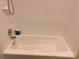 Bathtub with white subway tile surround at 9207 Branson Ct, Charlotte, NC 28210