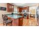 Spacious kitchen featuring stainless steel appliances and a pass-through to the dining area at 100 Oakwood Meadow Dr, Mooresville, NC 28115