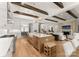 Open concept kitchen with a large island, stainless steel appliances, and seamless flow to the living area at 10201 Laurier Ln, Huntersville, NC 28078