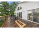 Back porch with outdoor seating, a fire pit, and lake views at 1077 Jackson Rd, Fort Lawn, SC 29714