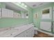 Bathroom features double sink vanity, toilet, and light green paint at 1077 Jackson Rd, Fort Lawn, SC 29714