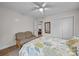 Bedroom with full bed, ceiling fan, closet, and laminate wood flooring at 1077 Jackson Rd, Fort Lawn, SC 29714