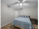 A cozy bedroom with wood floors and a five-blade ceiling fan at 1077 Jackson Rd, Fort Lawn, SC 29714