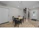 Dining area with black chairs with a matching staircase at 1077 Jackson Rd, Fort Lawn, SC 29714