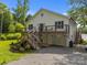 Beautifully designed home boasting a wooden deck, well-kept lawn, and a convenient garage space at 1077 Jackson Rd, Fort Lawn, SC 29714