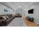 Spacious living area with hardwood floors, vaulted ceiling, and comfortable seating at 1077 Jackson Rd, Fort Lawn, SC 29714
