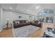 Bright living room with hardwood floors, plush sofas, and a scenic view at 1077 Jackson Rd, Fort Lawn, SC 29714