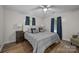 Inviting bedroom with wood floors, soft lighting, and stylish decor at 1077 Jackson Rd, Fort Lawn, SC 29714