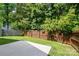 Private backyard features a patio and wood fence at 1162 Willet Dr, Rock Hill, SC 29732