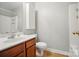 Bathroom featuring a wood vanity, framed mirror, and neutral walls at 1162 Willet Dr, Rock Hill, SC 29732