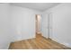 Cozy bedroom featuring light hardwood floors and white walls, enhancing the room's spacious feel at 1162 Willet Dr, Rock Hill, SC 29732