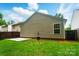 The rear exterior of this home has horizontal siding and a small concrete patio at 1162 Willet Dr, Rock Hill, SC 29732