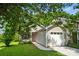 Charming single-story home with a well-maintained yard, attached garage, and inviting front porch at 1162 Willet Dr, Rock Hill, SC 29732