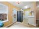 Bright kitchen with stainless steel appliances, window, and white cabinetry at 1162 Willet Dr, Rock Hill, SC 29732