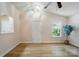 Bright and airy living room featuring new flooring, vaulted ceiling, and ample natural light at 1162 Willet Dr, Rock Hill, SC 29732