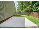 A charming patio space with a privacy fence provides a serene outdoor retreat for relaxation and entertainment at 1162 Willet Dr, Rock Hill, SC 29732