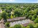 Overhead shot of the community featuring parking and lush trees at 1228 Archdale Dr # H, Charlotte, NC 28217