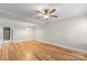 Spacious, light-filled room with beautiful wood flooring and elegant crown molding at 1228 Archdale Dr # H, Charlotte, NC 28217