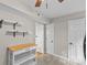 Kitchen view of a table, storage, and doors at 1228 Archdale Dr # H, Charlotte, NC 28217