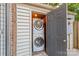 Convenient laundry area with stacked washer and dryer units at 1228 Archdale Dr # H, Charlotte, NC 28217