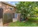 Enclosed patio area with brick wall, outdoor storage and access to AC units at 1228 Archdale Dr # H, Charlotte, NC 28217
