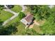 Aerial view of a home featuring a cozy back porch and mature trees at 1302 N Ellis St, Salisbury, NC 28144