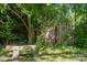 Backyard area with stone bench at 1302 N Ellis St, Salisbury, NC 28144
