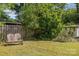 Cozy backyard featuring mature tree coverage and a bench at 1302 N Ellis St, Salisbury, NC 28144