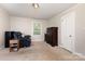 Comfortable bedroom with soft carpet, a window, and ample space for relaxation and personalization at 1302 N Ellis St, Salisbury, NC 28144