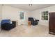 Cozy bedroom features neutral walls, plush carpet, and a window for natural light, creating a serene retreat at 1302 N Ellis St, Salisbury, NC 28144
