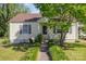 Inviting single-story home featuring a well-manicured lawn and a charming walkway leading to the front door at 1302 N Ellis St, Salisbury, NC 28144