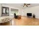 Cozy living room showcasing hardwood floors, neutral walls, and a comfortable seating area bathed in natural light at 1302 N Ellis St, Salisbury, NC 28144