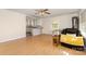 Inviting living room with hardwood floors flows into the bright, open kitchen, perfect for entertaining guests at 1302 N Ellis St, Salisbury, NC 28144
