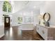 Spacious foyer featuring hardwood floors, neutral tones, and high ceilings at 13029 Whisper Creek Dr, Charlotte, NC 28277